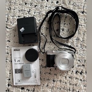 Nikon 1 J5 Compact Camera in Silver and Black